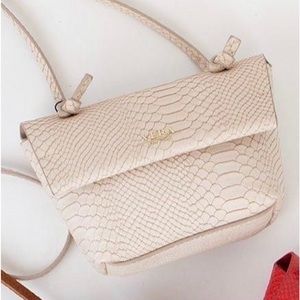 Vera New York's Genny Crossbody White Handbag keeps your stuff organized